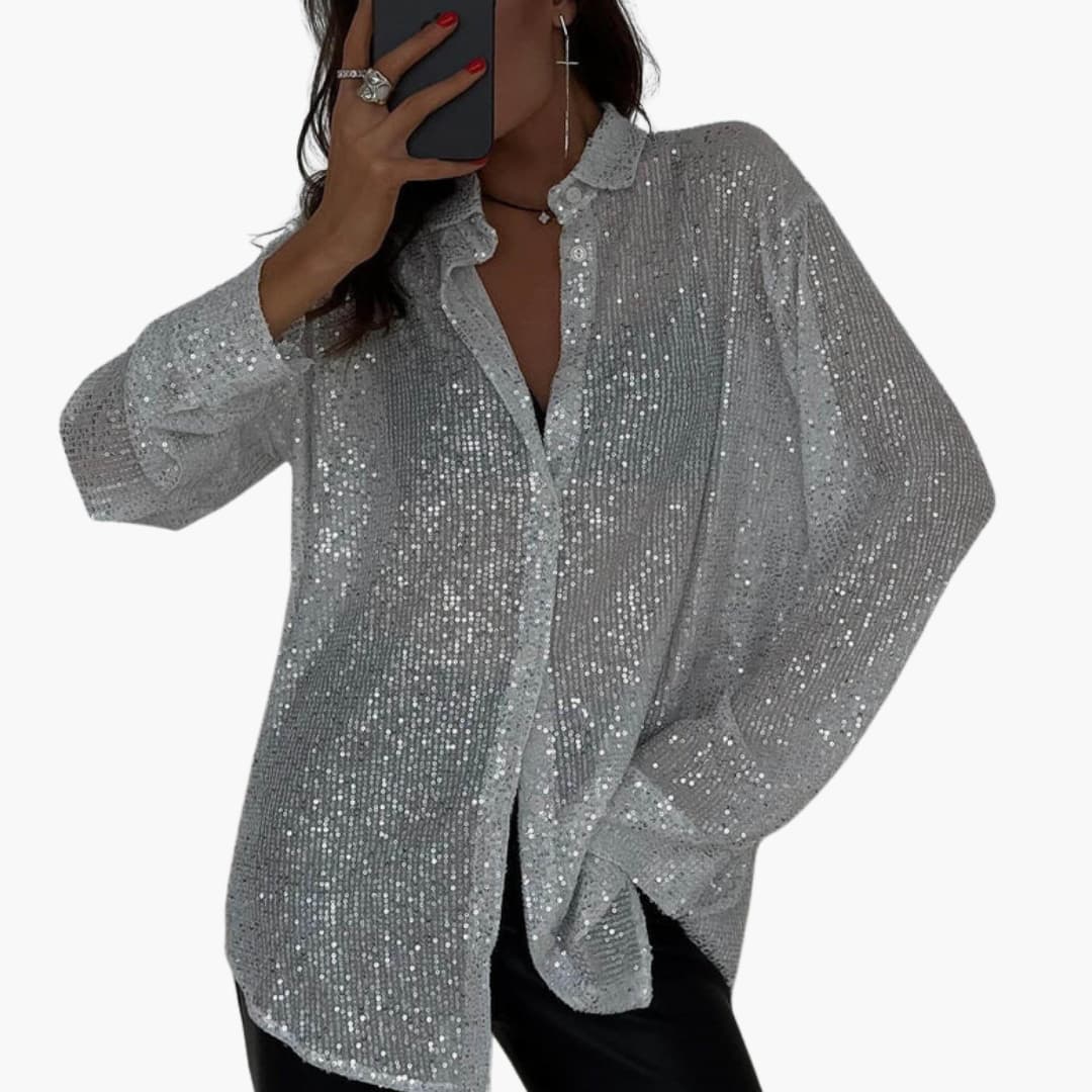 Oversize glitrende bluse til kvinder med lange ærmer og struktureret snit til en chic stil