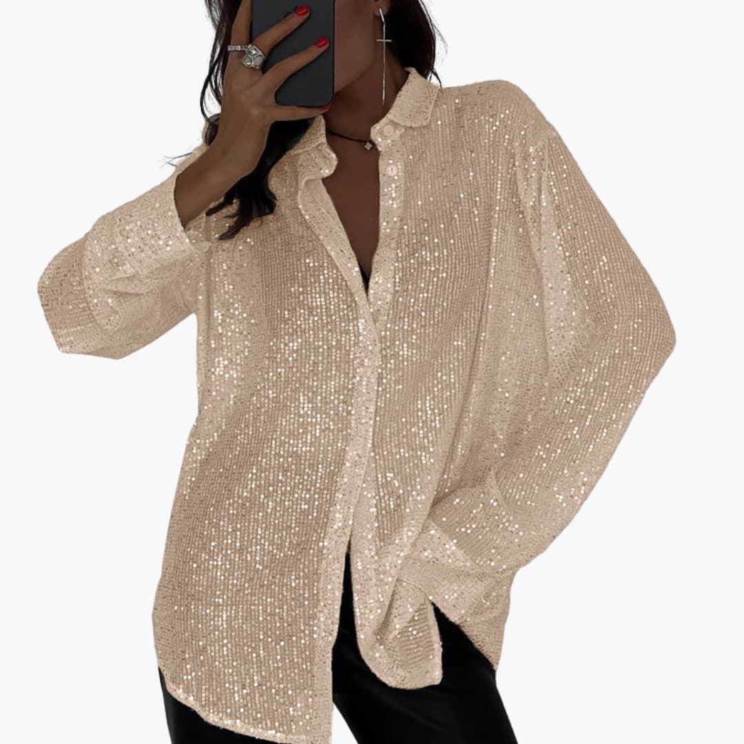 Oversize glitrende bluse til kvinder med lange ærmer og struktureret snit til en chic stil