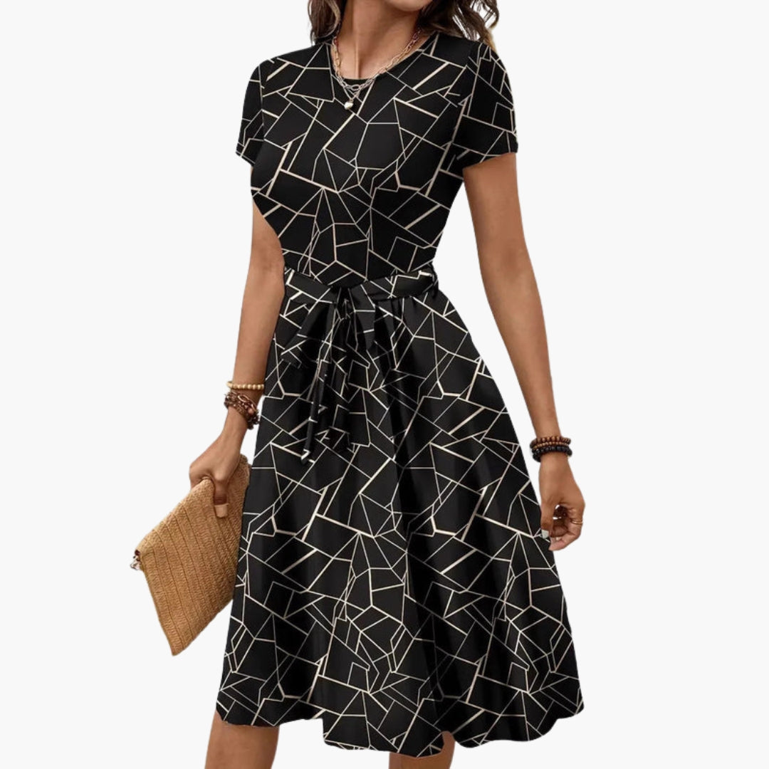 Combinaison femme manches courtes avec motif géométrique
