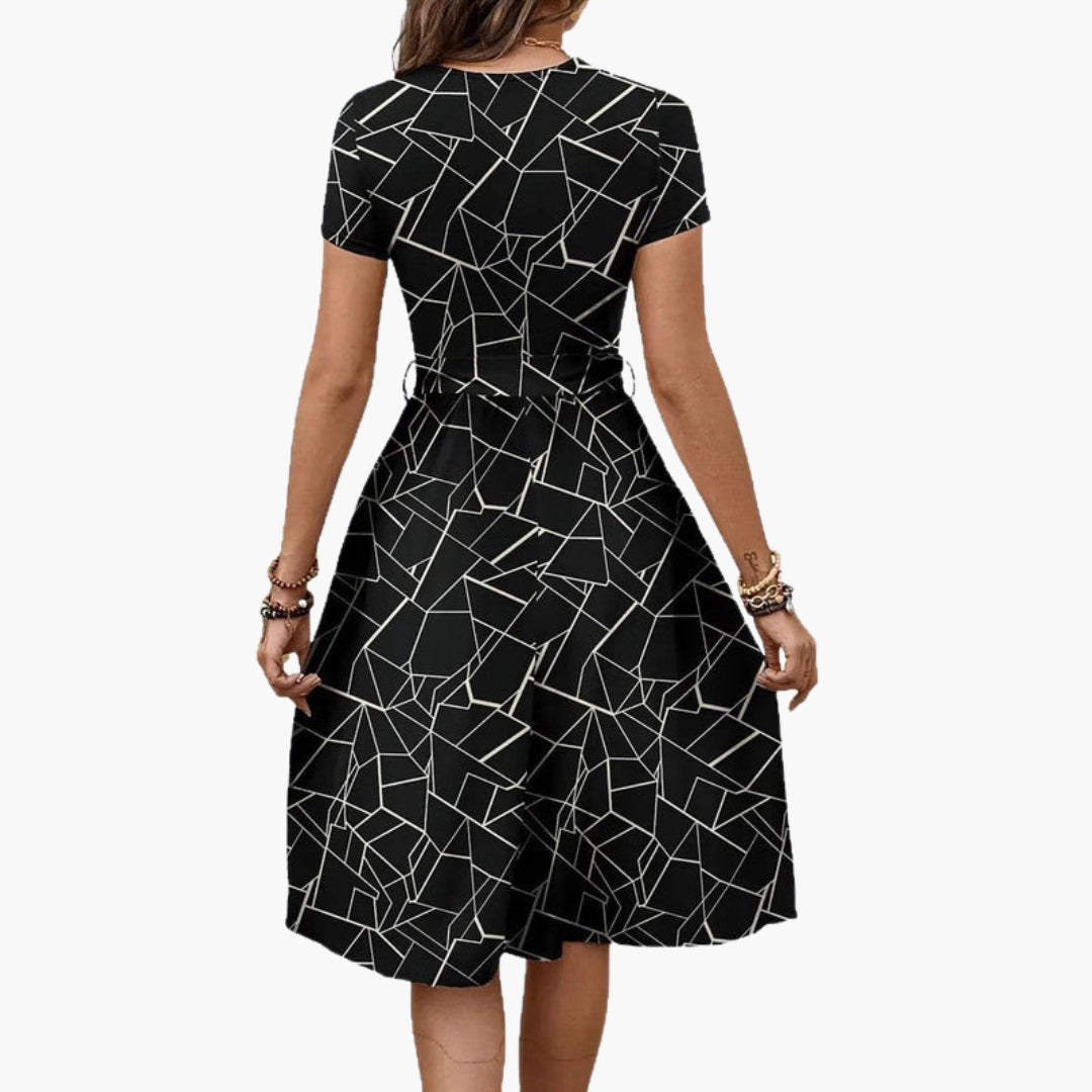 Combinaison femme manches courtes avec motif géométrique