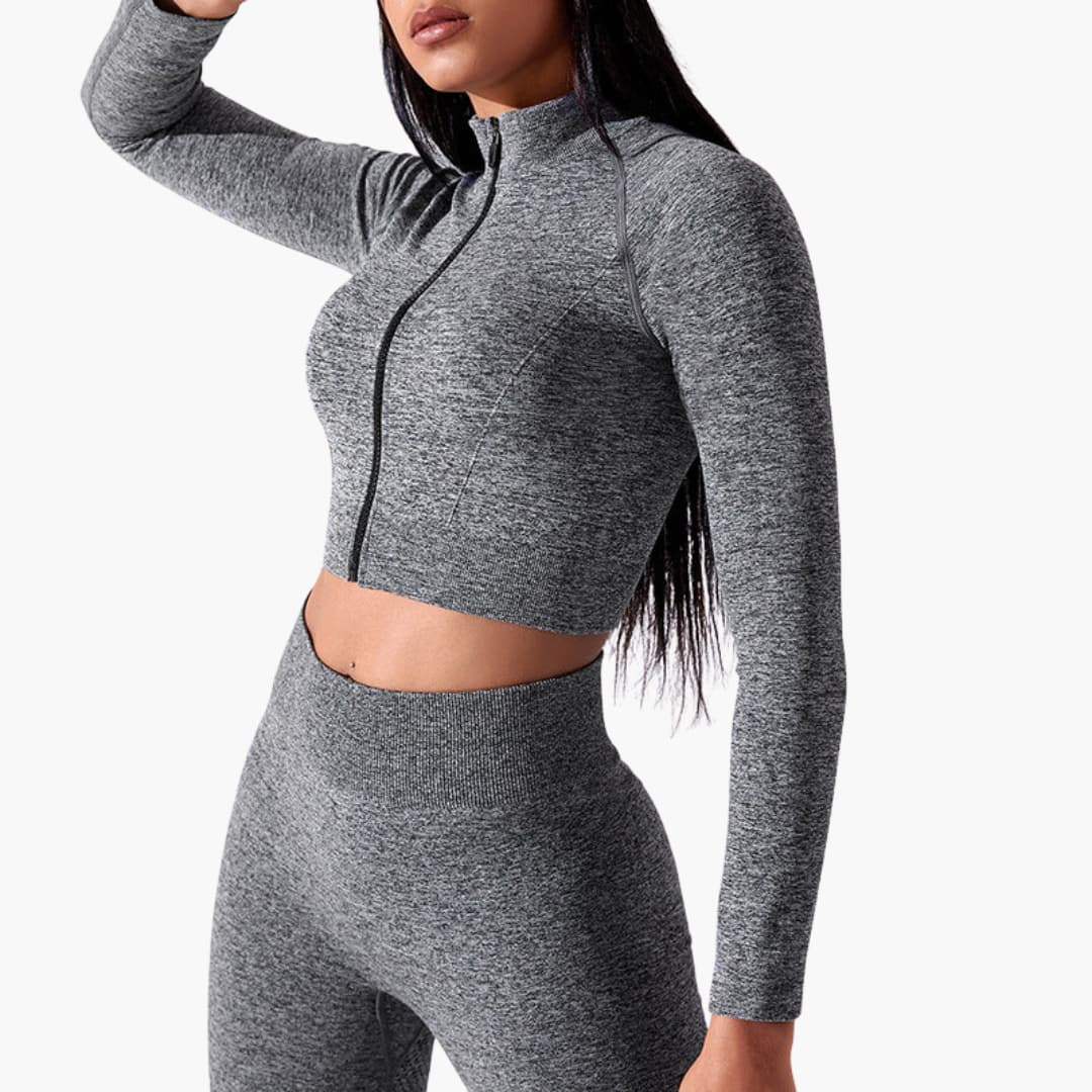 Women's sports crop top with front zipper closure and sleeveless cut