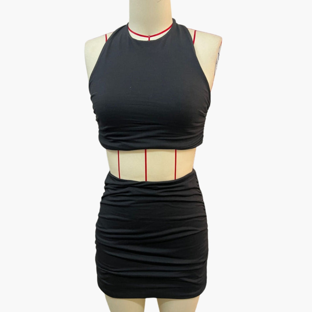 Conjunto Mujer Dos Piezas con Top de Espalda Descubierta y Mini Falda