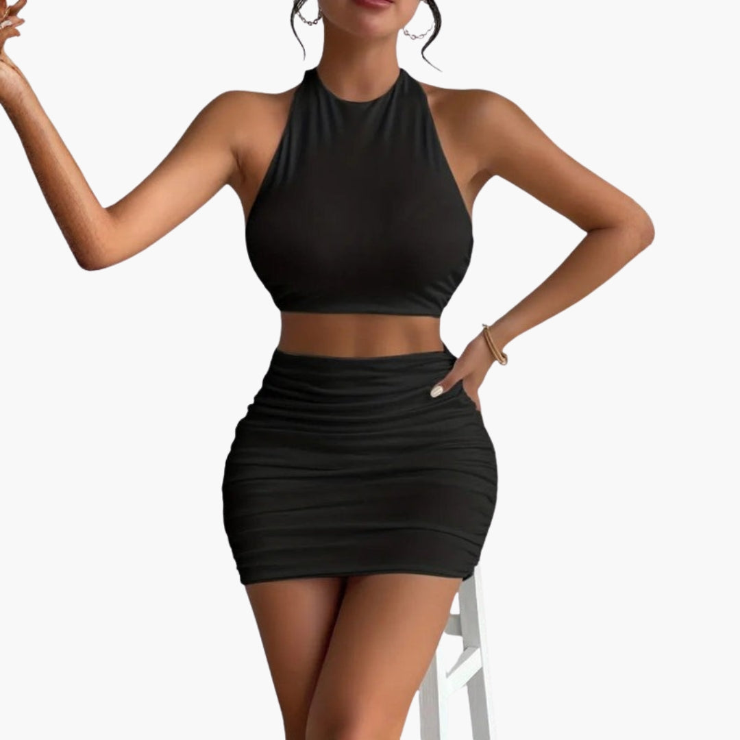 Conjunto Mujer Dos Piezas con Top de Espalda Descubierta y Mini Falda