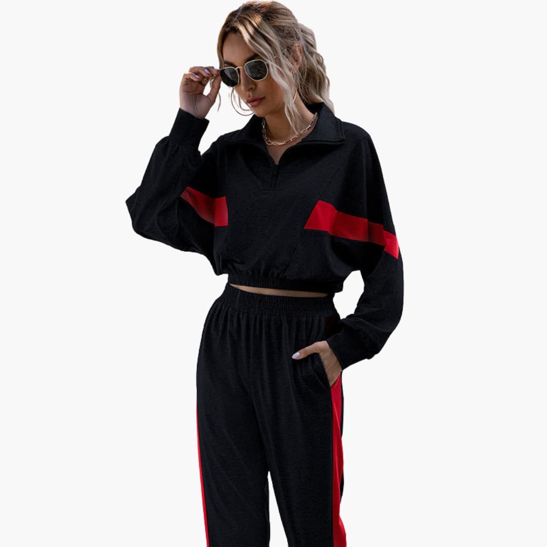 Conjunto deportivo para mujer con cuello con cremallera y puños elásticos