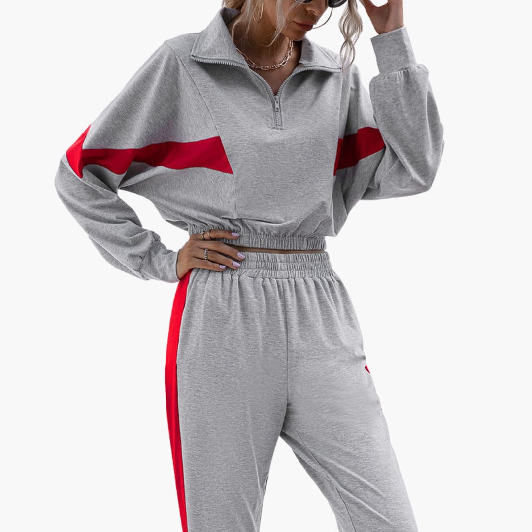 Conjunto deportivo para mujer con cuello con cremallera y puños elásticos