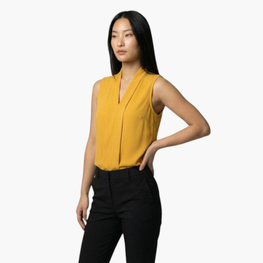 Dames mouwloze top met V-hals en plooien aan de voorkant