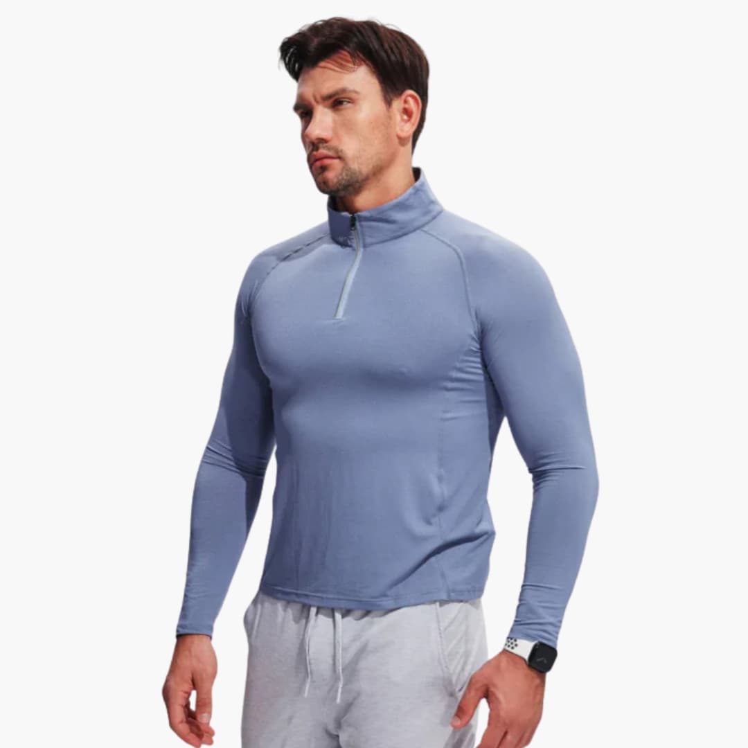 Haut d’entraînement pour homme avec demi zip et col montant