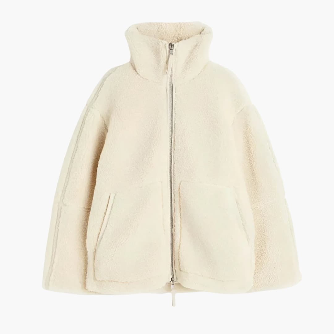 Women's fleece jacket with stand-up collar and zip closure