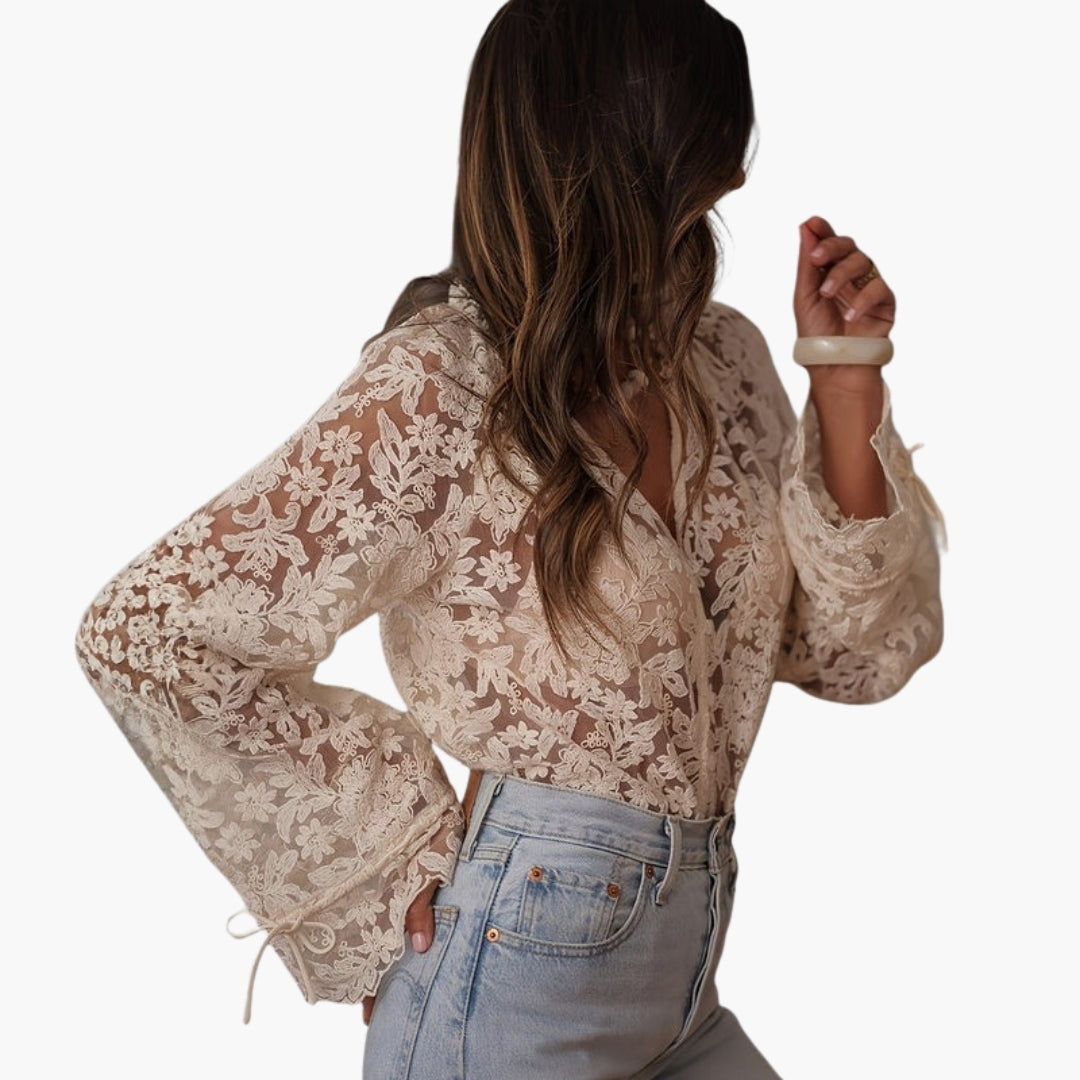 Blouse femme avec col en V et broderie florale