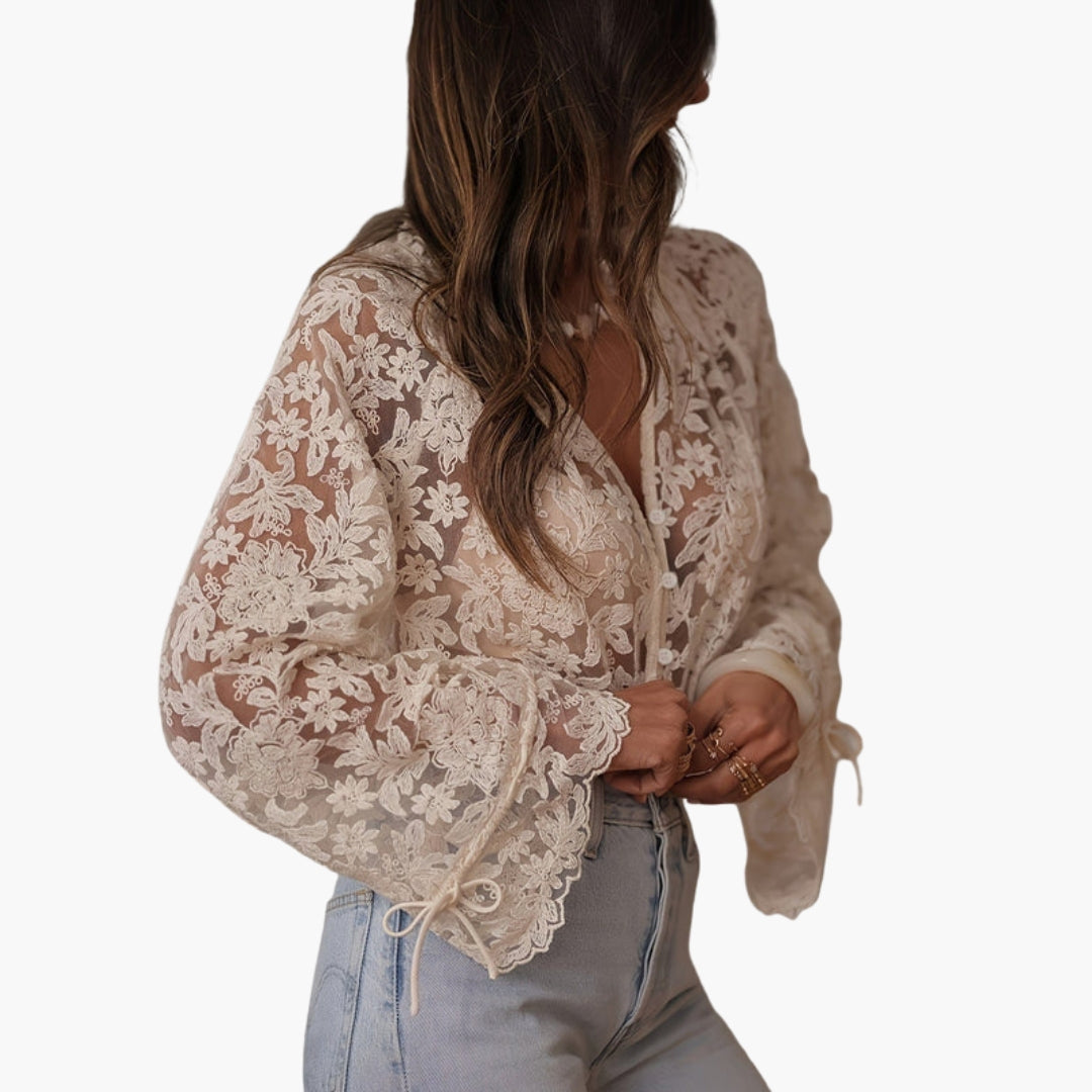 Blouse femme avec col en V et broderie florale