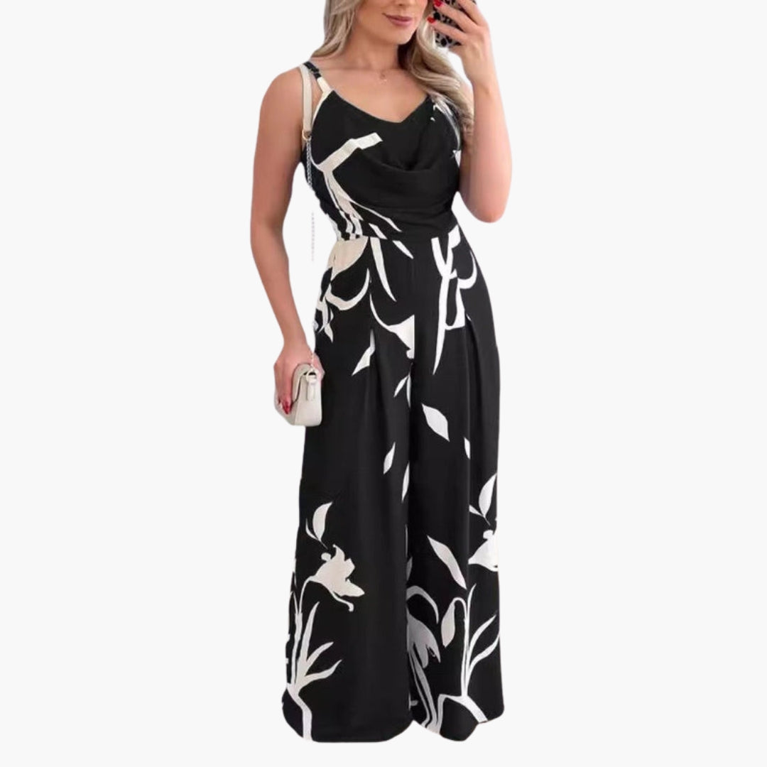Damoverall med draperad halsringning och vida ben