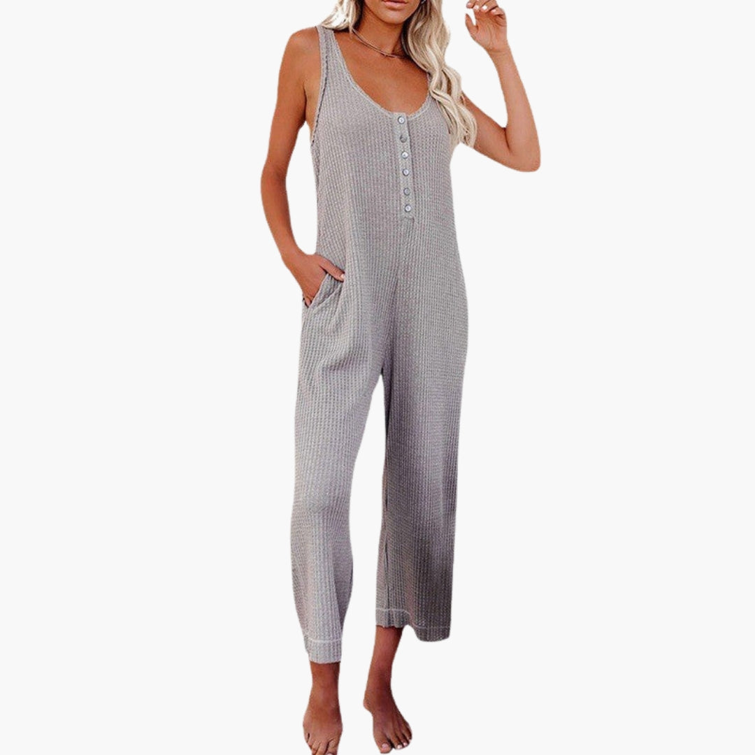 Combinaison femme avec patte de boutonnage et poches