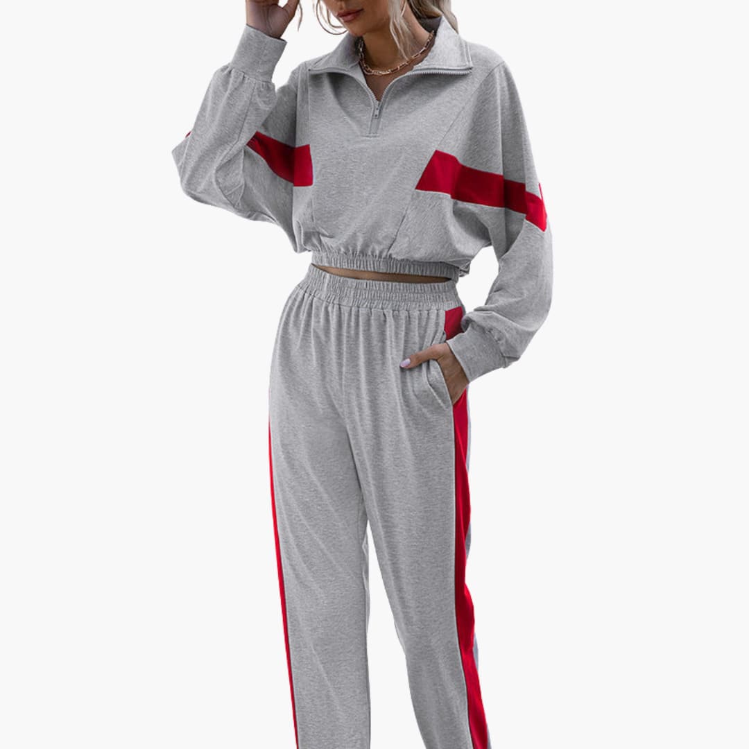 Completo sportivo donna con collo con zip e polsini elasticizzati