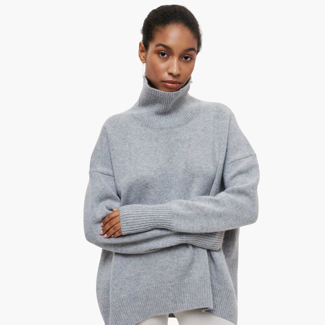 Damenpullover aus Strick mit Stehkragen und geripptem Saum