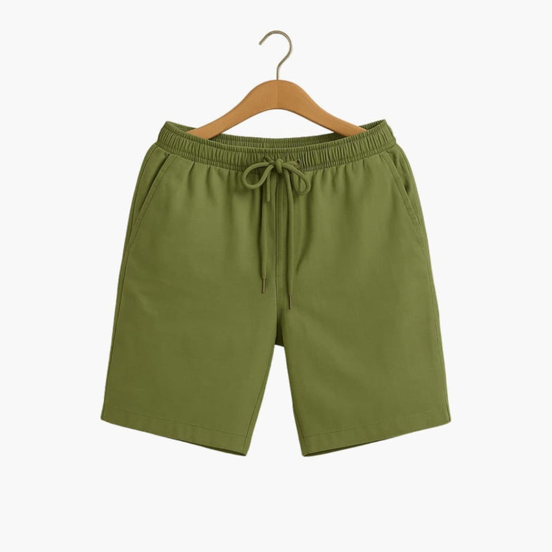 Short homme a taille à poches latérales et  surface unie
